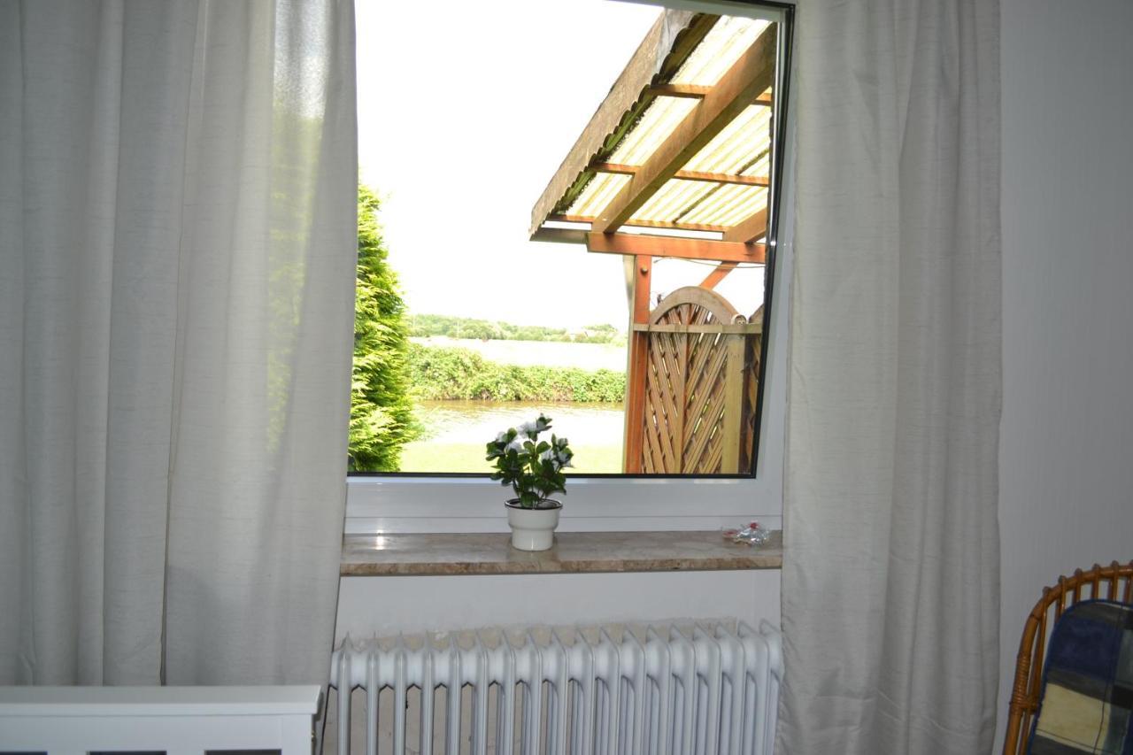 Ferienhaus Am Wasser Hinte Экстерьер фото